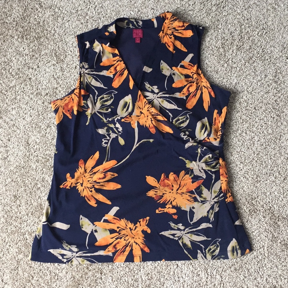 Sleeveless floral print wrap blouse. Size M